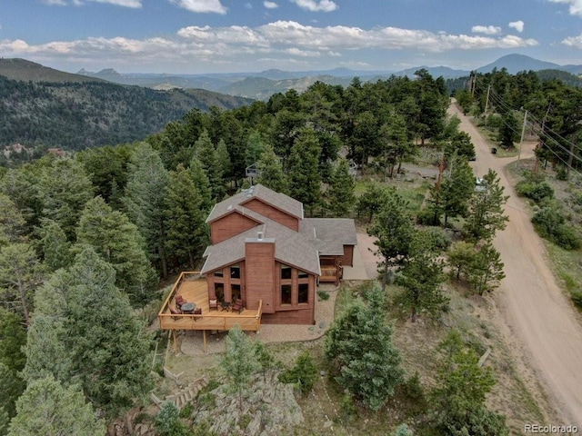220 Long Ridge Dr, Bailey, CO 80421 - view from above of property featuring a forest and a mountain backdrop