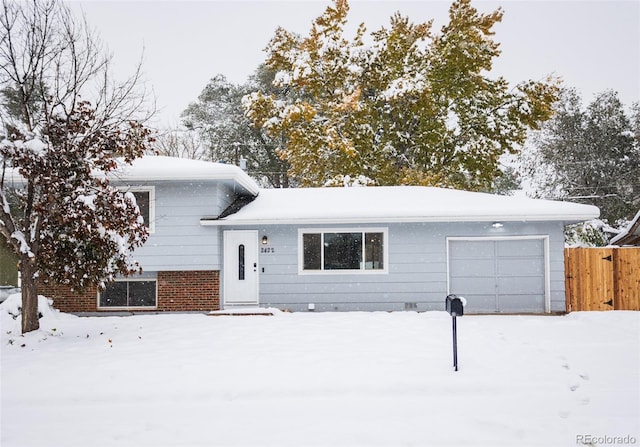 split level home featuring a garage