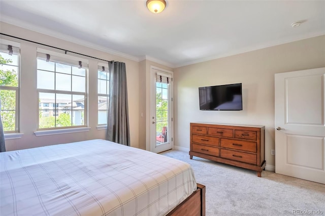 bedroom featuring access to exterior, multiple windows, light colored carpet, baseboards, and ornamental molding