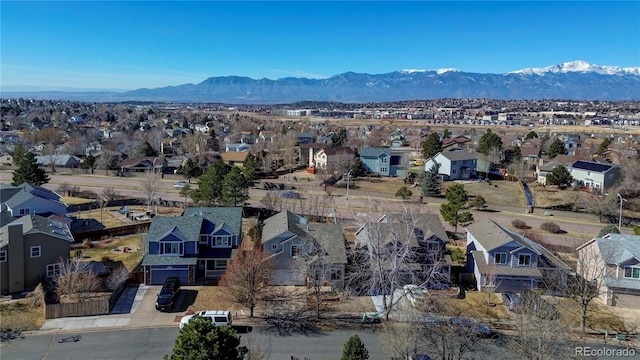 bird's eye view with a residential view and a mountain view