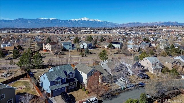 bird's eye view featuring a mountain view and a residential view