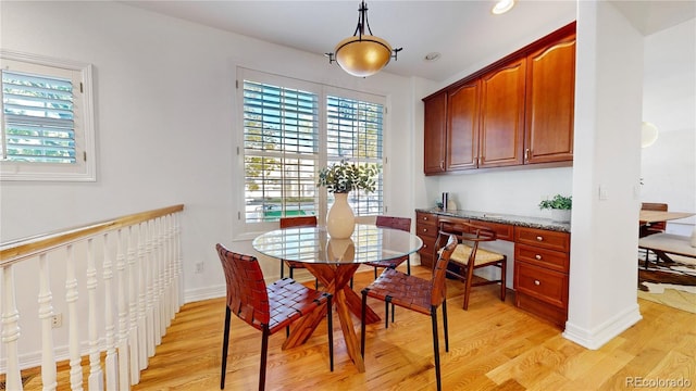 203 S Jackson St, Denver, CO 80209 - dining area featuring light wood-style floors, plenty of natural light, and recessed lighting