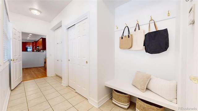 203 S Jackson St, Denver, CO 80209 - mudroom featuring light tile patterned flooring and baseboards