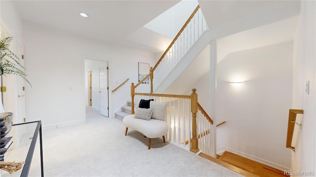 203 S Jackson St, Denver, CO 80209 - sitting room with carpet, an upstairs landing, and recessed lighting
