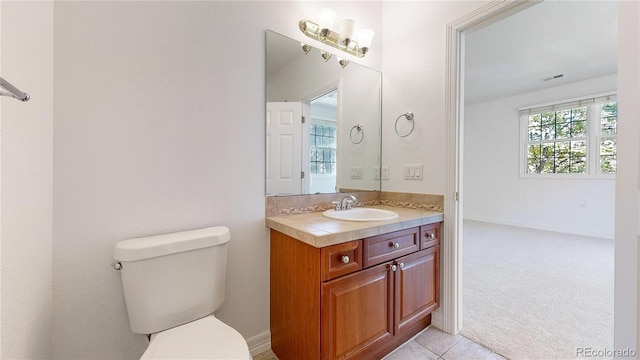 203 S Jackson St, Denver, CO 80209 - bathroom with vanity and tile patterned flooring