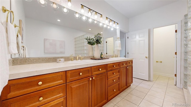 203 S Jackson St, Denver, CO 80209 - bathroom with double vanity and tile patterned flooring