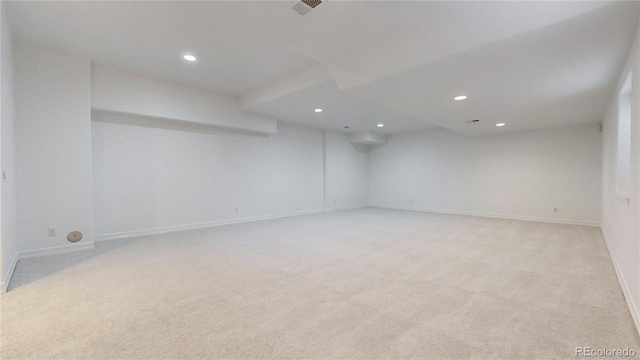 203 S Jackson St, Denver, CO 80209 - finished below grade area featuring recessed lighting and light colored carpet