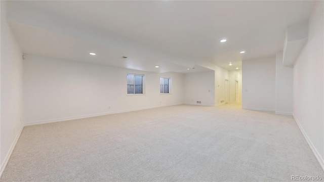 203 S Jackson St, Denver, CO 80209 - below grade area with recessed lighting and light colored carpet