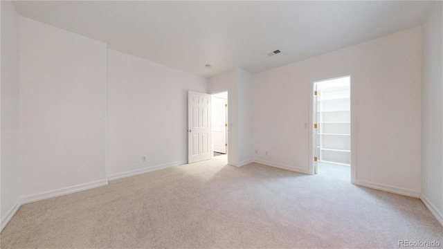 203 S Jackson St, Denver, CO 80209 - empty room with light carpet and baseboards