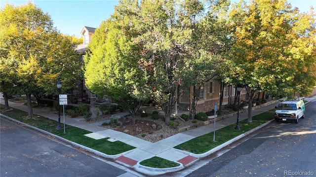 203 S Jackson St, Denver, CO 80209 - view of property exterior featuring stone siding