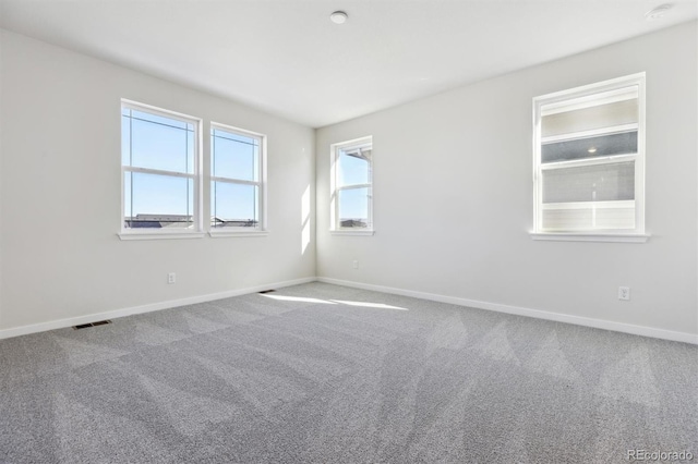 view of carpeted spare room