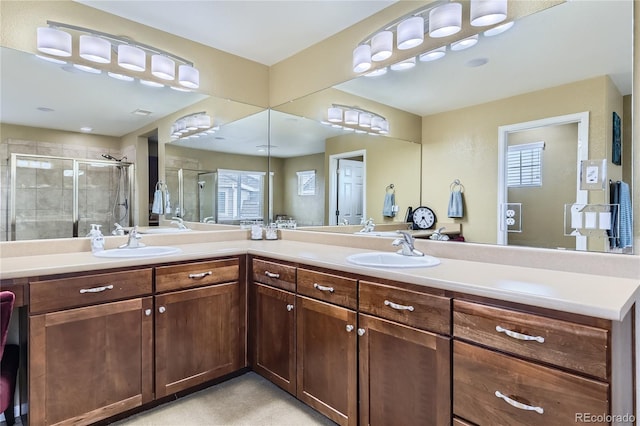 16059 E Grass River Pl, Parker, CO 80134 - full bathroom with a shower stall and double vanity