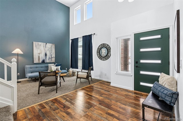 foyer with dark hardwood / wood-style flooring