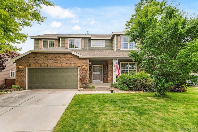10284 Royal Eagle St, Highlands Ranch, CO 80129 - view of front of property featuring driveway, a front yard, an attached garage, brick siding, and roof with shingles