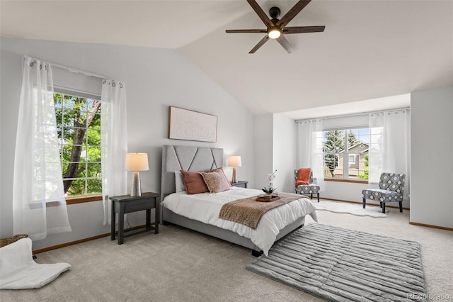 10284 Royal Eagle St, Highlands Ranch, CO 80129 - carpeted bedroom with multiple windows, vaulted ceiling, and ceiling fan