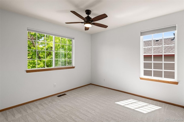 10284 Royal Eagle St, Highlands Ranch, CO 80129 - unfurnished room featuring healthy amount of natural light, carpet flooring, and a ceiling fan