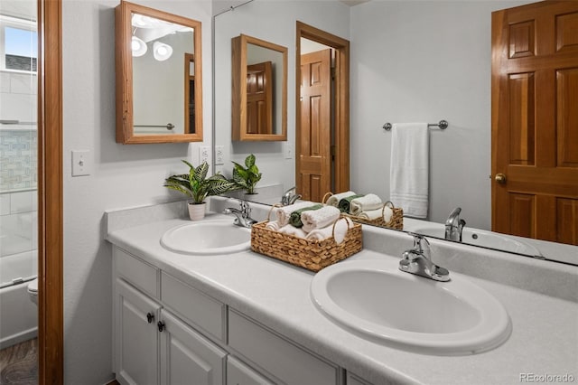 10284 Royal Eagle St, Highlands Ranch, CO 80129 - bathroom featuring double vanity and toilet