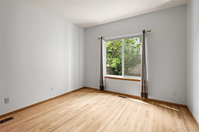 10284 Royal Eagle St, Highlands Ranch, CO 80129 - spare room with wood finished floors and baseboards