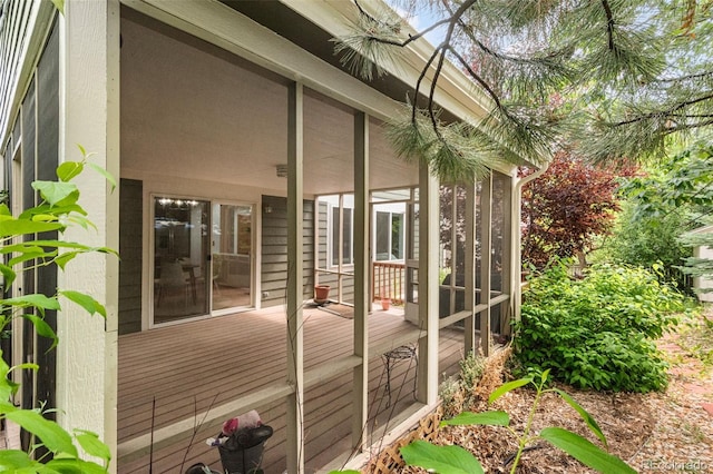 10284 Royal Eagle St, Highlands Ranch, CO 80129 - wooden deck featuring a sunroom