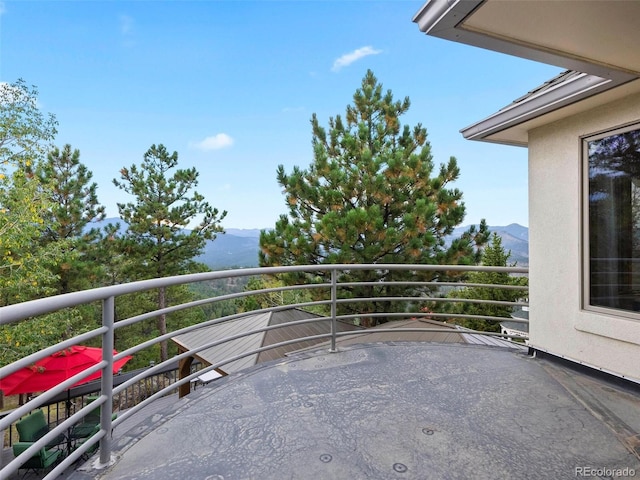 balcony featuring a mountain view