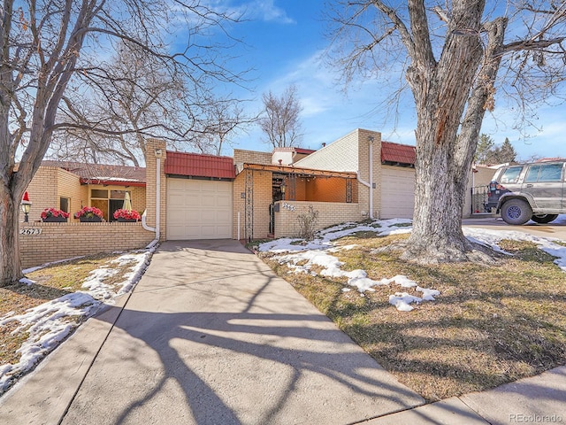 view of front of home with a garage