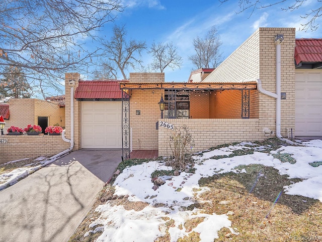 view of front of home featuring a garage