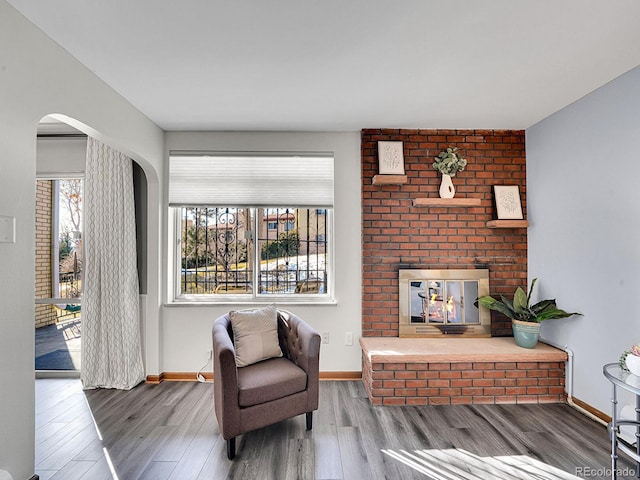 sitting room featuring hardwood / wood-style floors