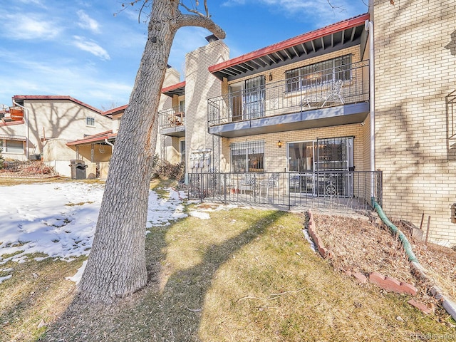 view of front of home with a yard