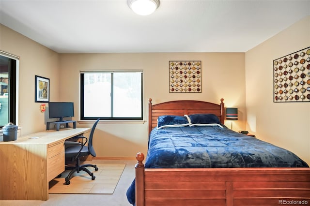 bedroom featuring baseboards