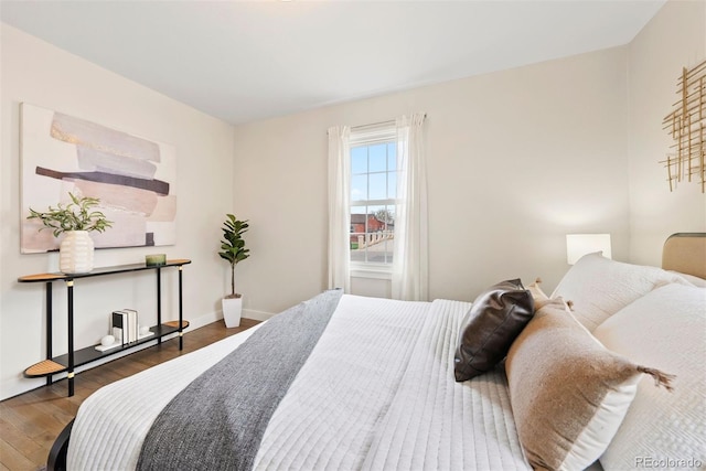 1805 W 51st Ave, Denver, CO 80221 - bedroom featuring baseboards and wood finished floors