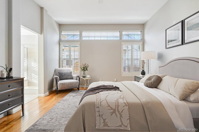 bedroom with light hardwood / wood-style flooring