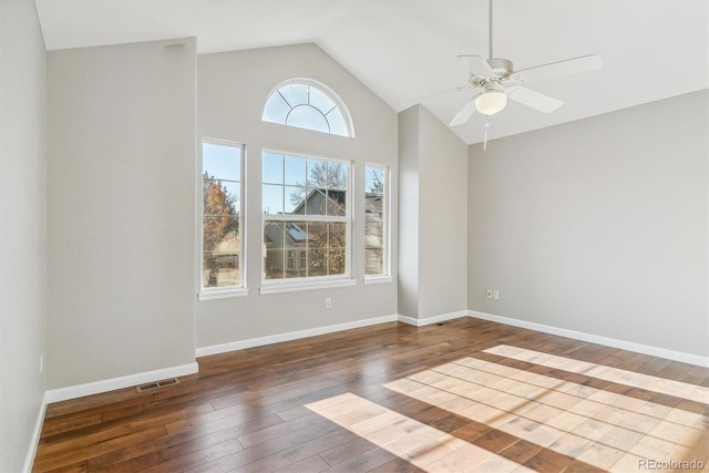 spare room featuring hardwood / wood-style flooring, ceiling fan, and lofted ceiling