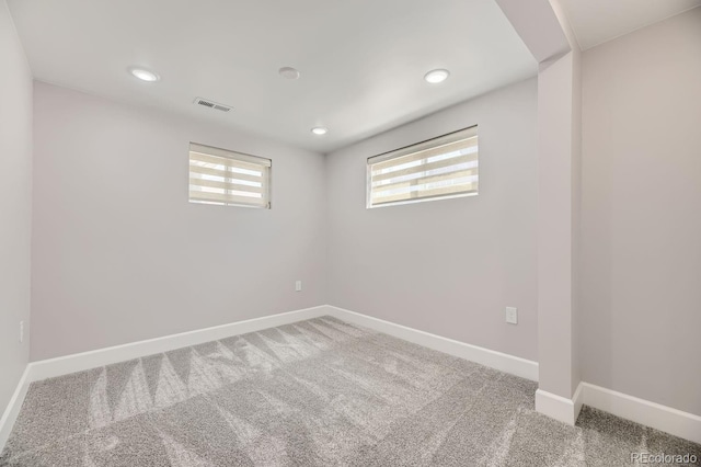 unfurnished room featuring carpet flooring