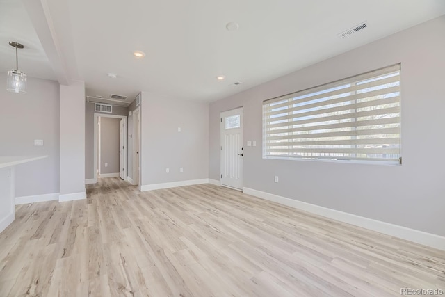 empty room featuring light hardwood / wood-style floors