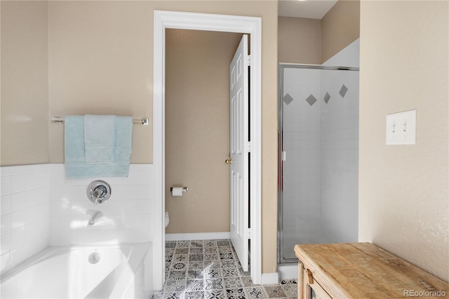 full bath featuring toilet, a stall shower, a tub, and tile patterned floors