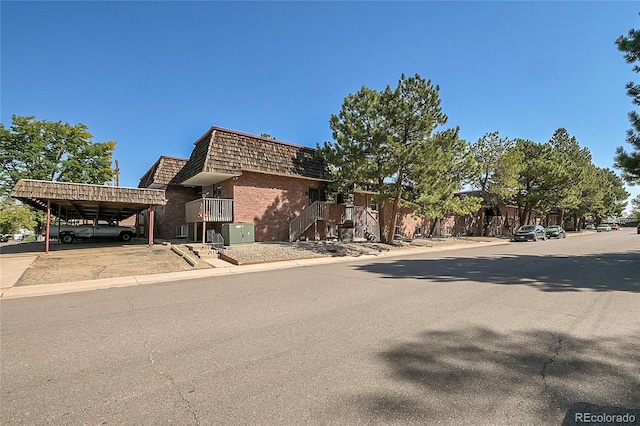 view of front facade featuring a carport