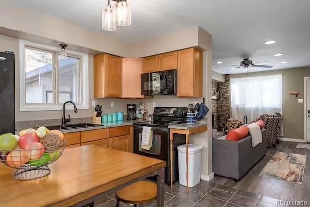 kitchen featuring ceiling fan, sink, black appliances, and light brown cabinets