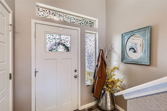 5153 Andes Way, Denver, CO 80249 - entryway featuring baseboards
