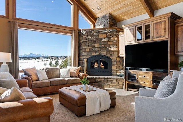 living area with high vaulted ceiling, beam ceiling, a fireplace, wood ceiling, and carpet flooring