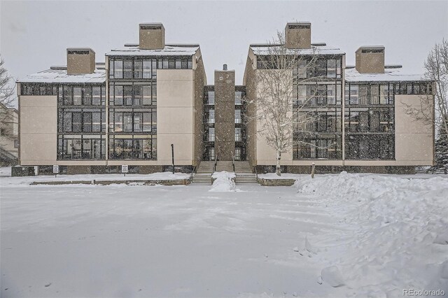 view of snow covered building