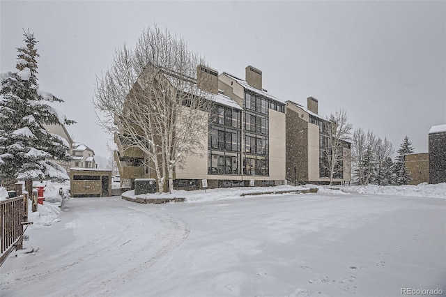 view of snow covered property