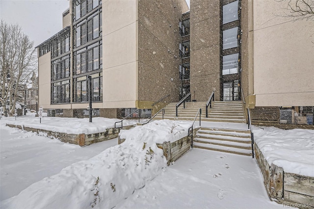 view of snow covered property