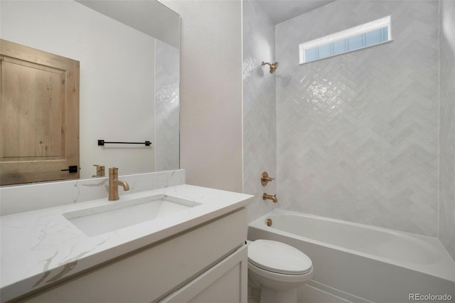 full bathroom with vanity, bathtub / shower combination, and toilet