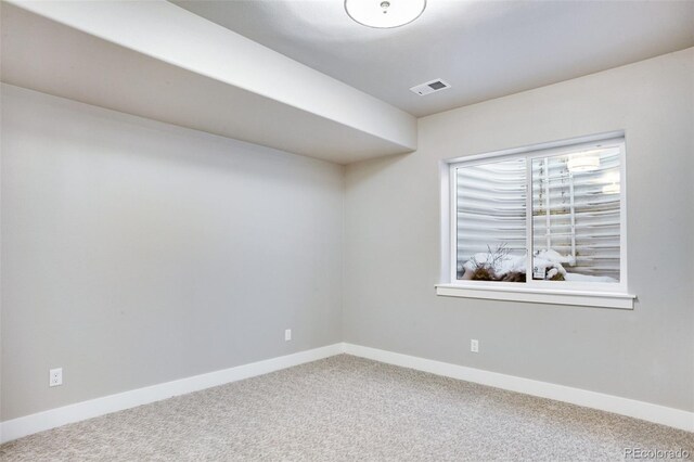 view of carpeted spare room