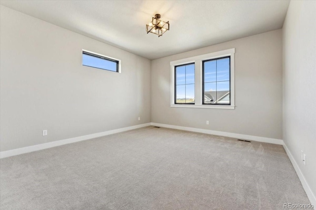 1361 Art Dr, Berthoud, CO 80513 - unfurnished room with plenty of natural light, light colored carpet, and baseboards