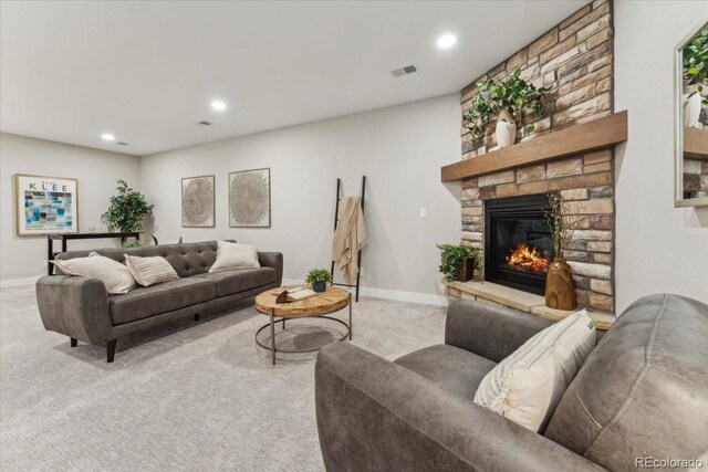 1361 Art Dr, Berthoud, CO 80513 - carpeted living room featuring a fireplace, recessed lighting, and baseboards