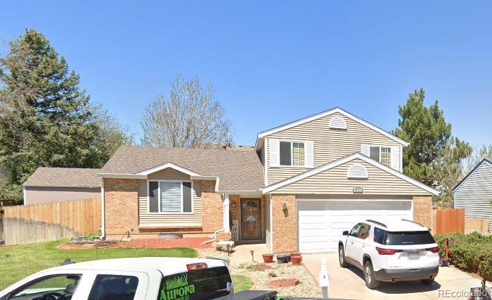 split level home featuring a garage