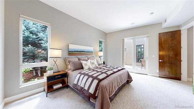 8041 E 29th Ave, Denver, CO 80238 - carpeted bedroom featuring multiple windows and access to exterior