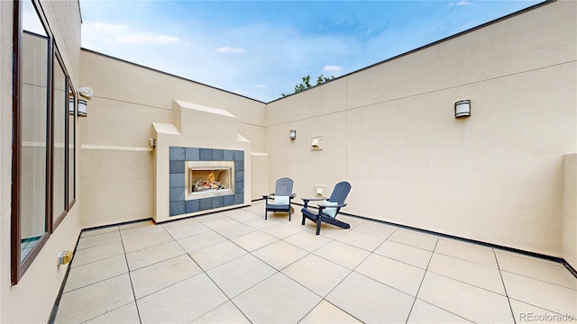 8041 E 29th Ave, Denver, CO 80238 - view of patio / terrace with a tiled fireplace
