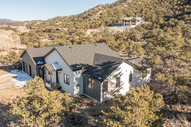 drone / aerial view featuring a mountain view